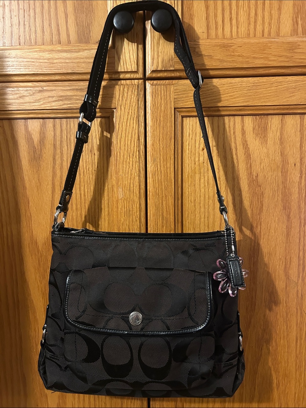 Coach Black Signature Jacquard Shoulder Bag with Pink Floral Charm